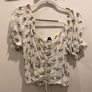 White Blouse with Blue Flowers